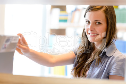 High school library student woman choose book