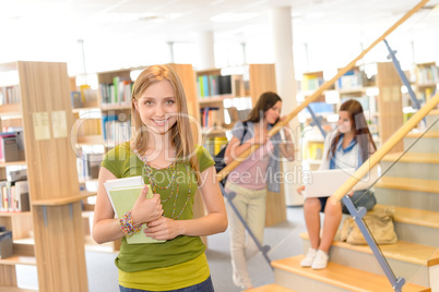 High school library teenage student in green