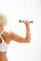 Muscular white fitness woman hold weights white