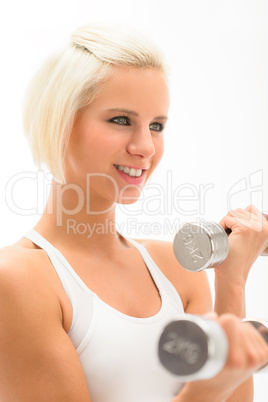 Woman exercise dumbbells white fitness close-up