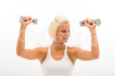 Fitness woman lifting weights looking biceps