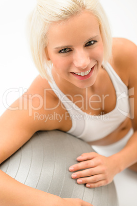 Woman fitness ball exercise on white background