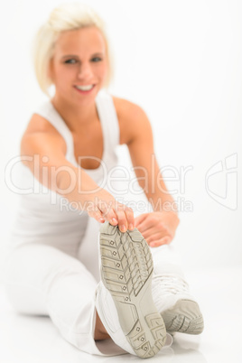 Woman stretch leg white fitness exercise