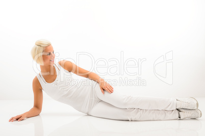 Fitness woman stretch body at Pilates exercise.