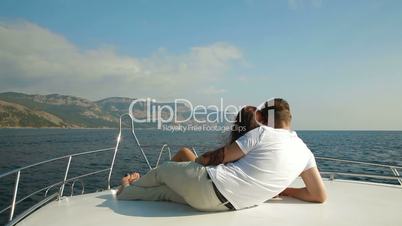 Couple Relaxing on a Speedboat