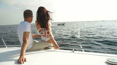 Couple Enjoying Vacation on a Speedboat
