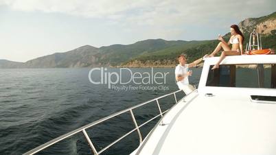 Couple Enjoying The Cruise on Yacht