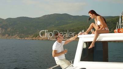 Couple Enjoying The Cruise on Yacht