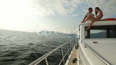 Couple Enjoying The Cruise on Yacht
