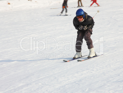 The skier quickly goes from mountain