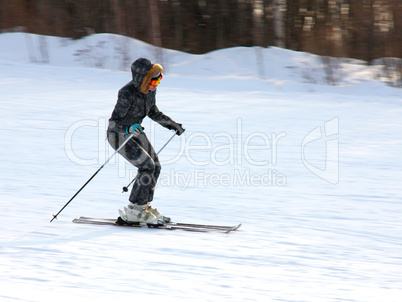 The young girl on skis