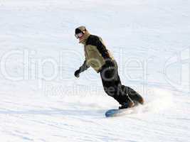 Snowboarder in a suit going from mountain