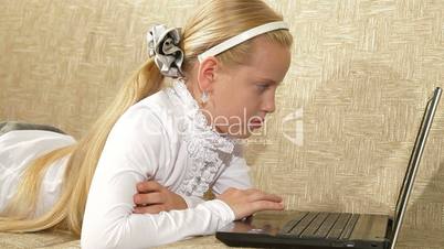 Little Girl Using Laptop