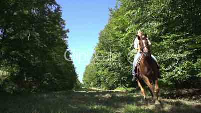 slow motion woman and horse on ride