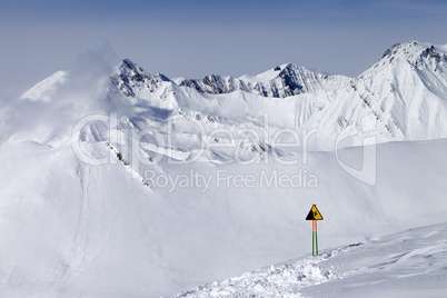 Warning sing on ski slope