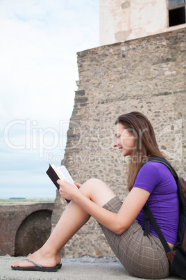 Teen girl reading the Bible