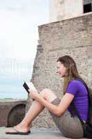 Teen girl reading the Bible