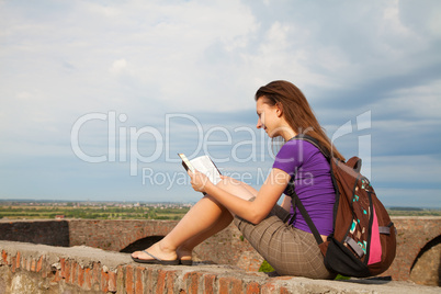 Teen girl reading the Bible