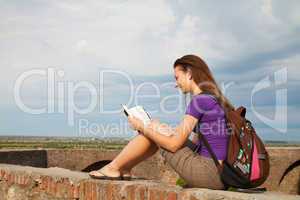 Teen girl reading the Bible