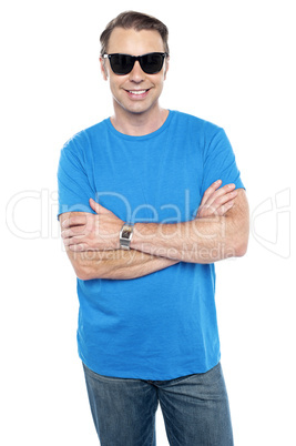 Cool dude wearing goggles, posing with arms crossed