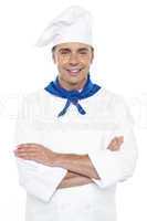 Closeup portrait of smiling young male chef