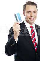 Business representative showing credit card