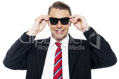 Stylish handsome businessman wearing shades