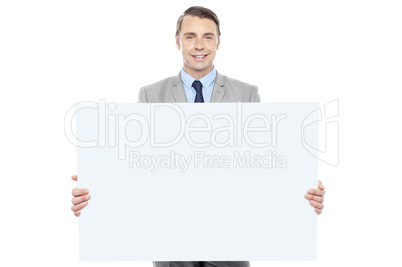 Business representative holding white billboard
