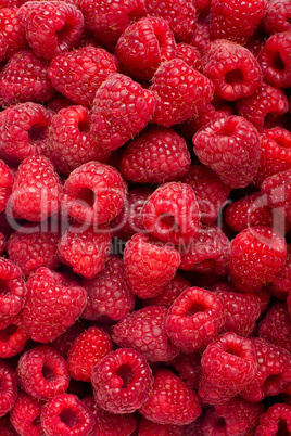 Ripe rasberry fruit horizontal close up background.