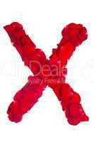 Letter X made from red petals rose on white