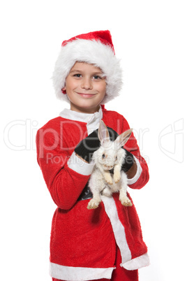 Boy holding a christmas rabbit