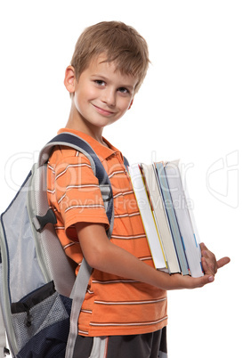 Boy holding books