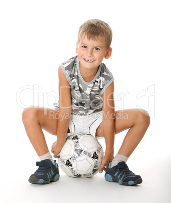 Boy holding soccer ball