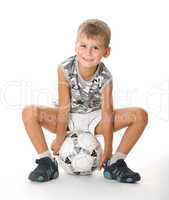 Boy holding soccer ball