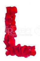 Letter L made from red petals rose on white