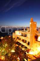 Sunset and building of luxury hotel, Tenerife island, Spain