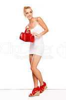 Fashionable woman in red accessories