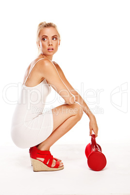 Trendy woman with red accessories