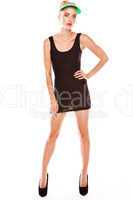 Woman posing in black miniskirt