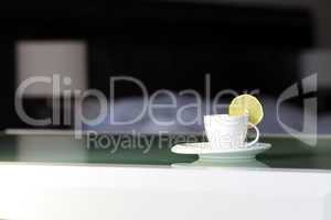 tea with lemon on the background of the bed and the lamp