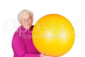 Elderly senior woman with gym ball