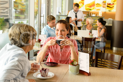 Senior woman with her daughter at cafe