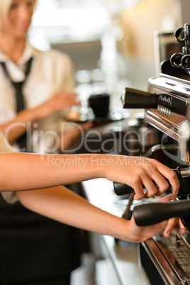 Close up hands waitress make coffee
