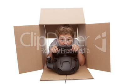 boy-driver of a cardboard box