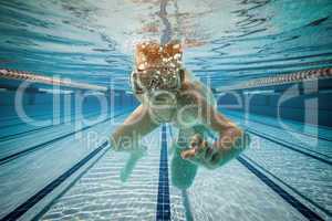 Boy swimming under water