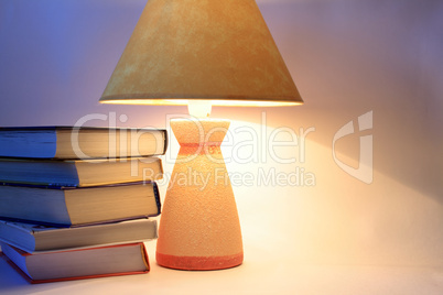Books Near Lamp