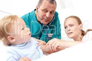 Doctor listen the baby with stethoscope.