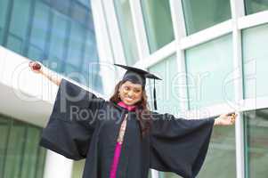 Excited Indian female graduate