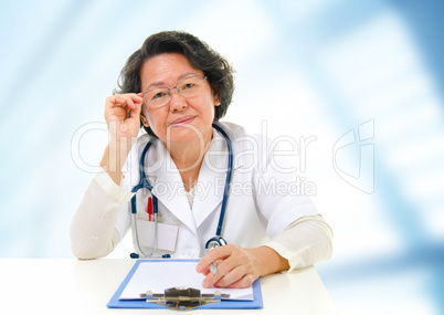 Asian senior female doctor