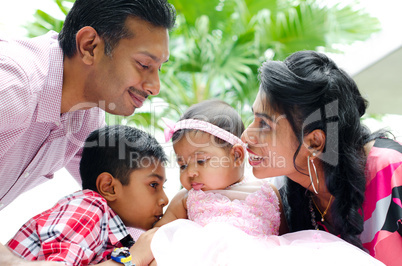 Happy Indian family with two children